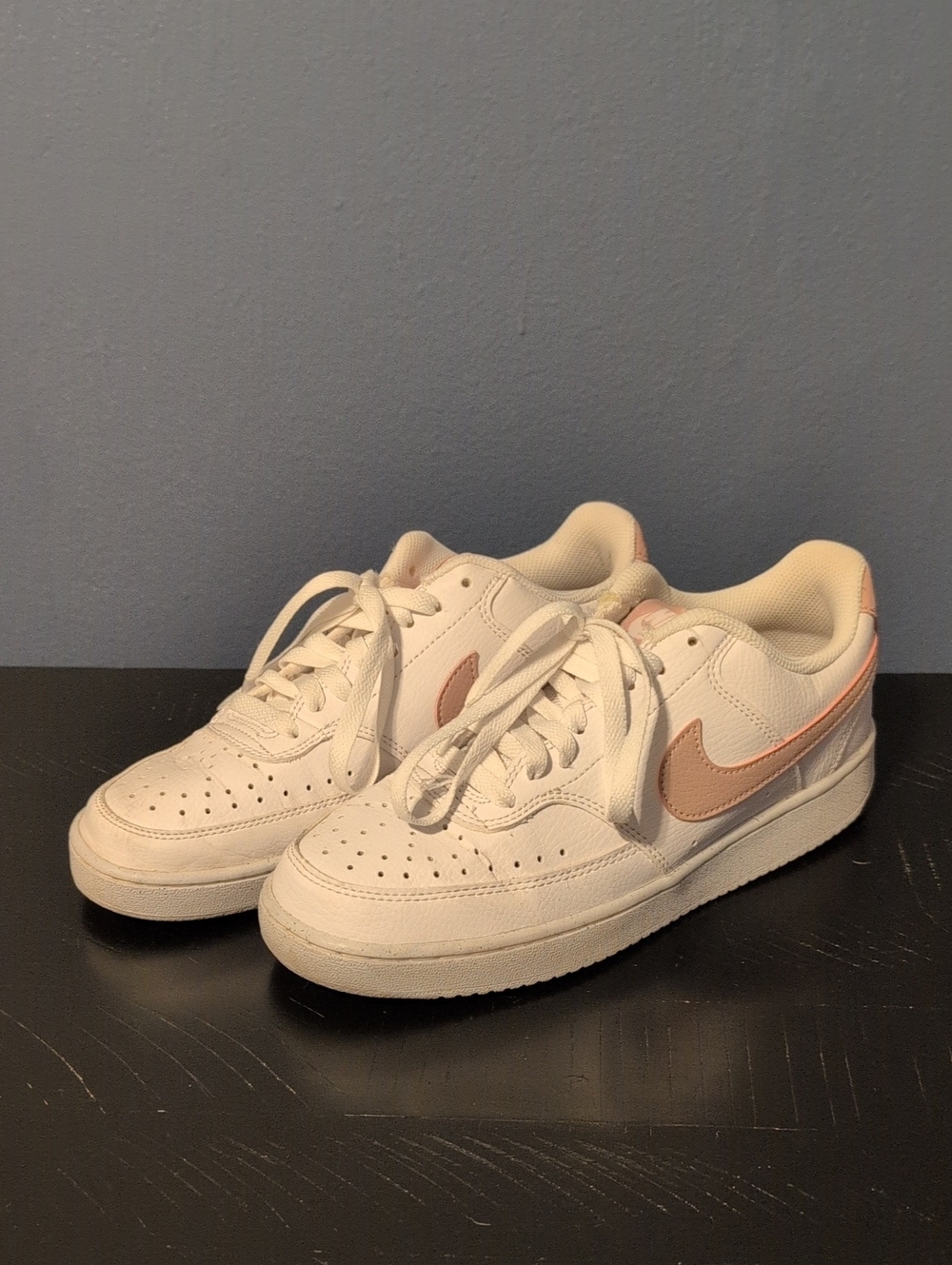 Nike Women's Cream Sneakers with Pink Swoosh Accent